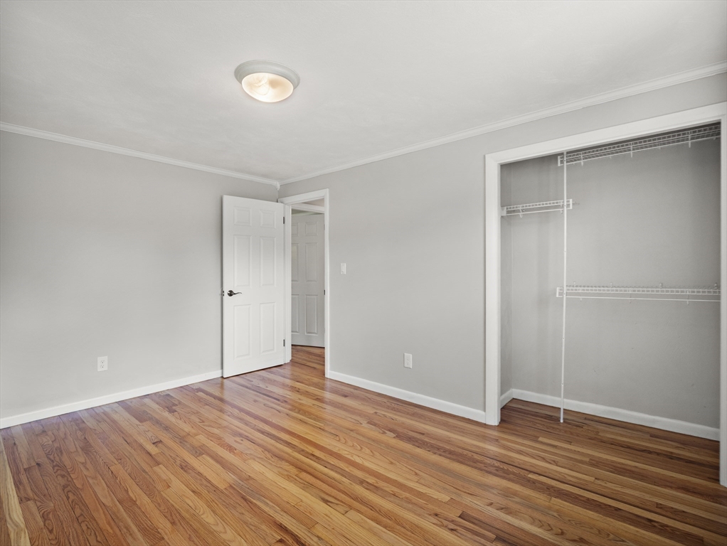 85 Dalton Road Chelmsford, MA 01824 - Photo 17 of 39 a view of an empty room with wooden floor