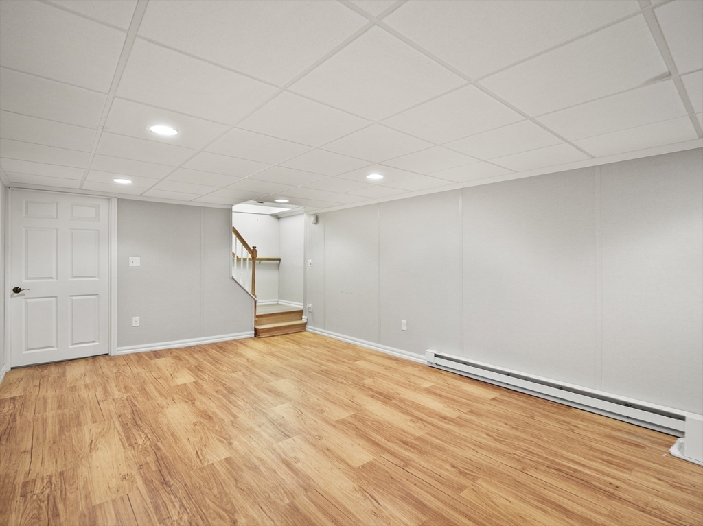 85 Dalton Road Chelmsford, MA 01824 - Photo 25 of 39 a view of an empty room with wooden floor