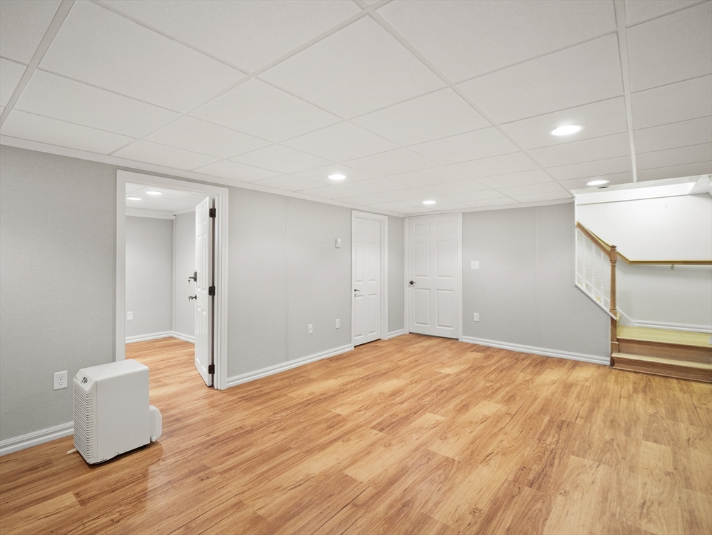85 Dalton Road Chelmsford, MA 01824 - Photo 26 of 39 a view of an empty room and wooden floor
