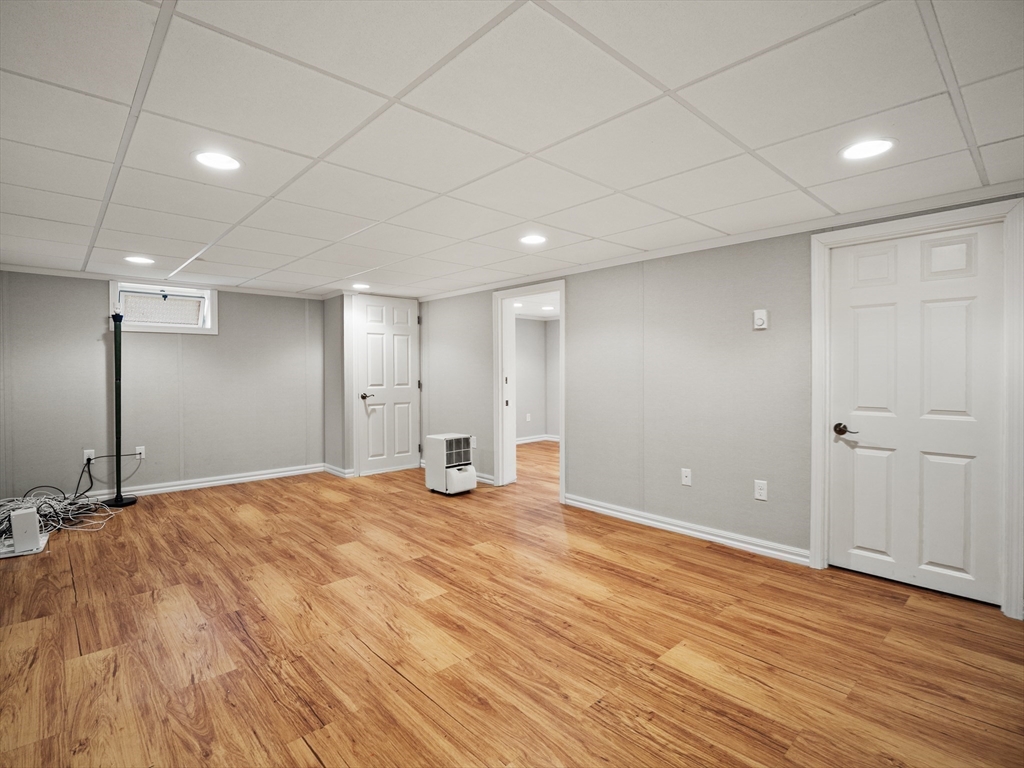 85 Dalton Road Chelmsford, MA 01824 - Photo 27 of 39 a view of an empty room with wooden floor