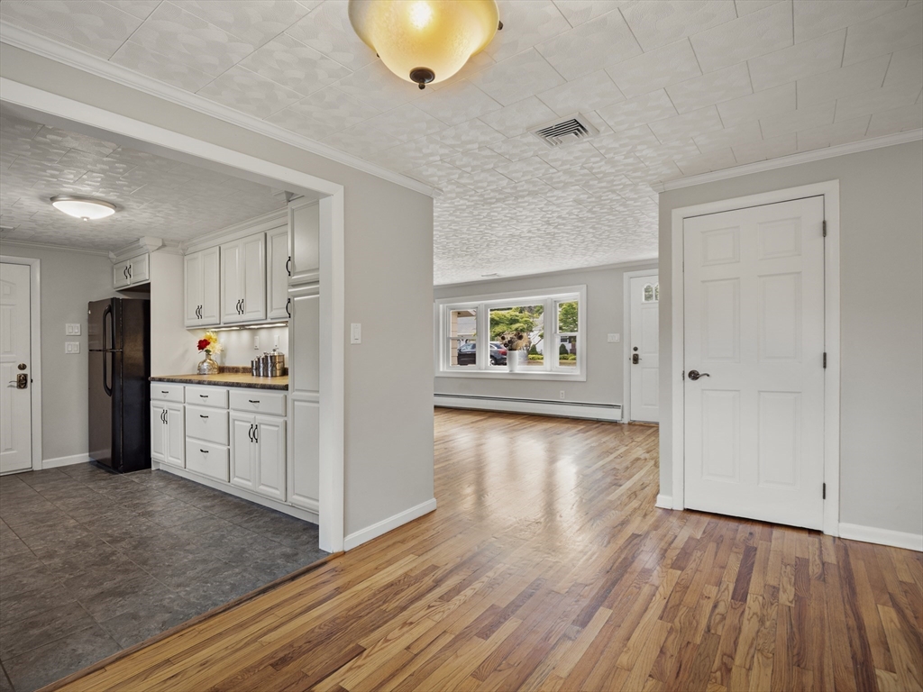 85 Dalton Road Chelmsford, MA 01824 - Photo 6 of 39 a kitchen with stainless steel appliances a refrigerator and a stove top oven