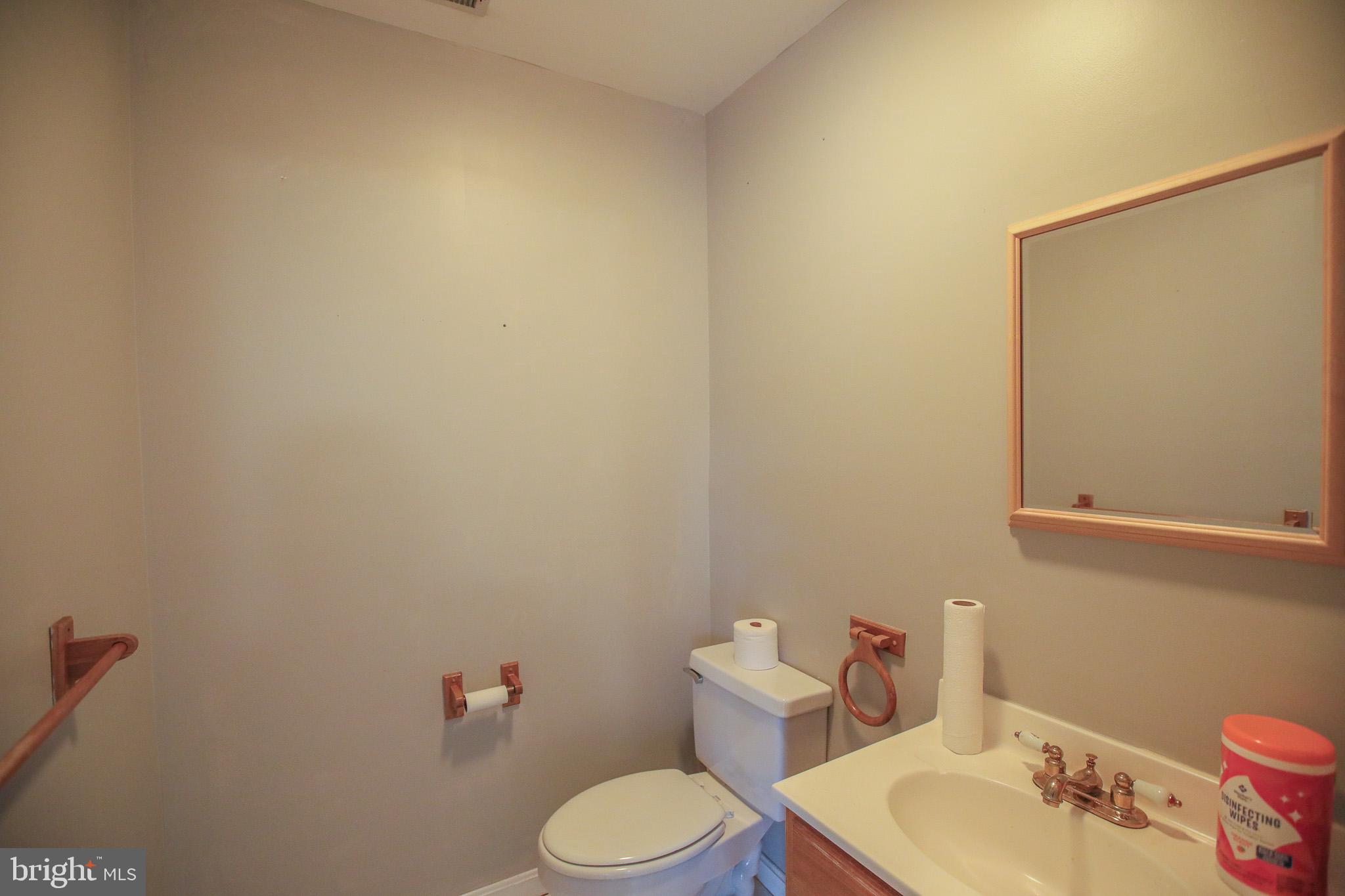 206 Blenny Lane Chester, MD 21619 - Photo 24 of 30 a white toilet sitting next to a bathroom sink