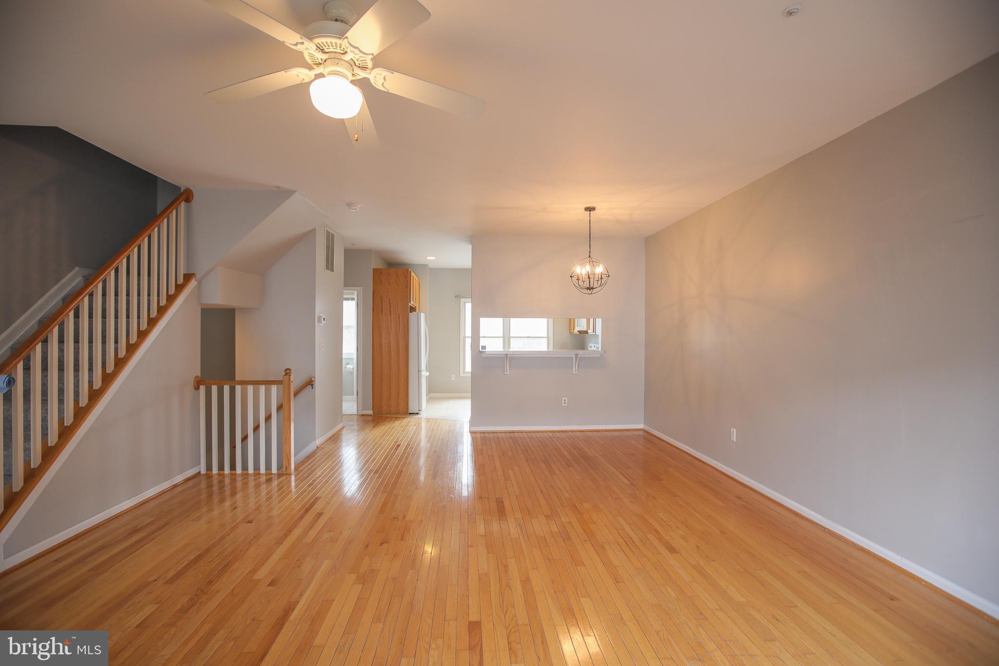 206 Blenny Lane Chester, MD 21619 - Photo 7 of 30 a view of a hallway with wooden floor