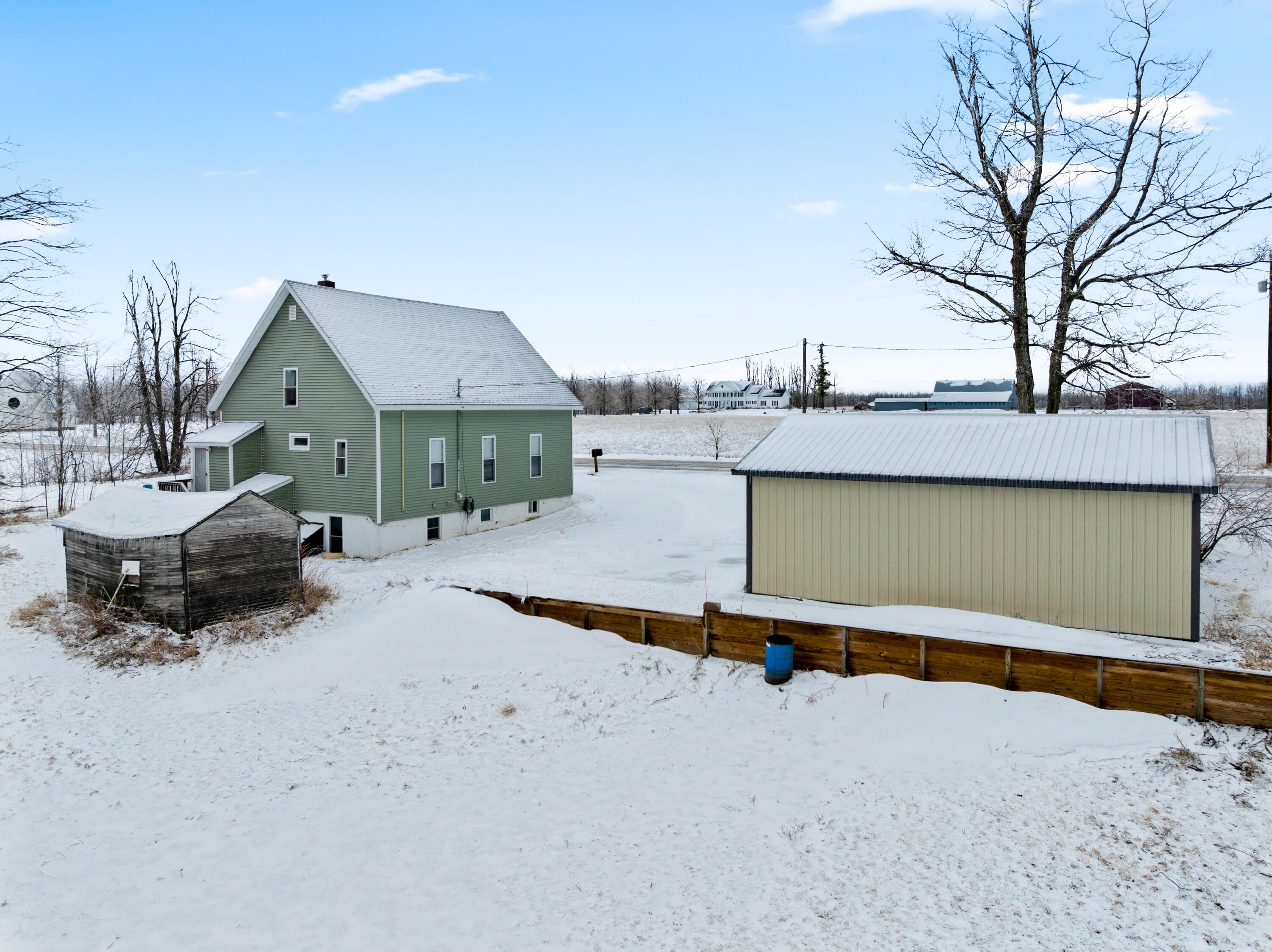 11825 Meridian Line Road Johannesburg, MI 49751 - Photo 6 of 45 rear view