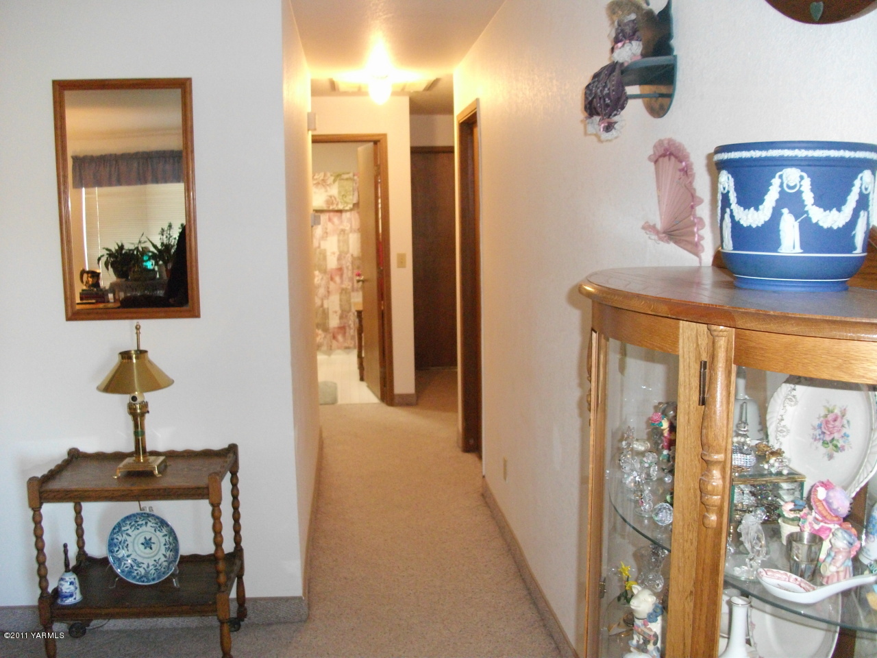 2350 Duffield Road Moxee, WA 98936 - Photo 11 of 21 a view of a hallway with entryway wooden floor and front door