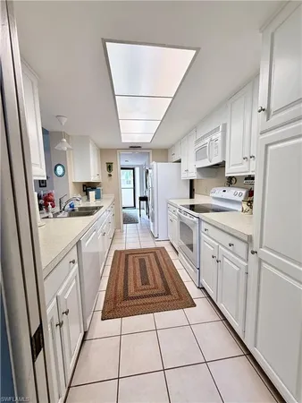 $7,000 | 15 Bluebill Avenue, Unit 206, Naples, FL 34108