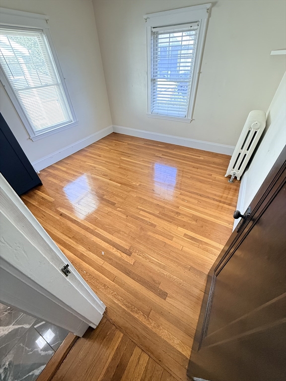 48 Rosewood Street, Unit 2 Boston, MA 02126 - Photo 14 of 26 a view of wooden floor