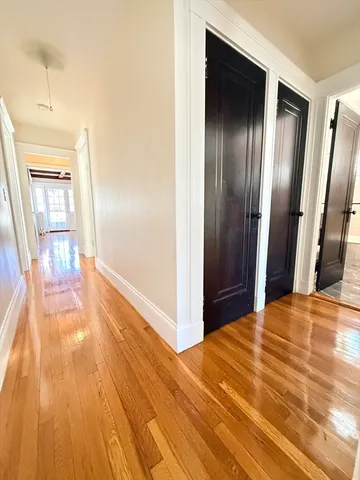 a view of a livingroom with wooden floor