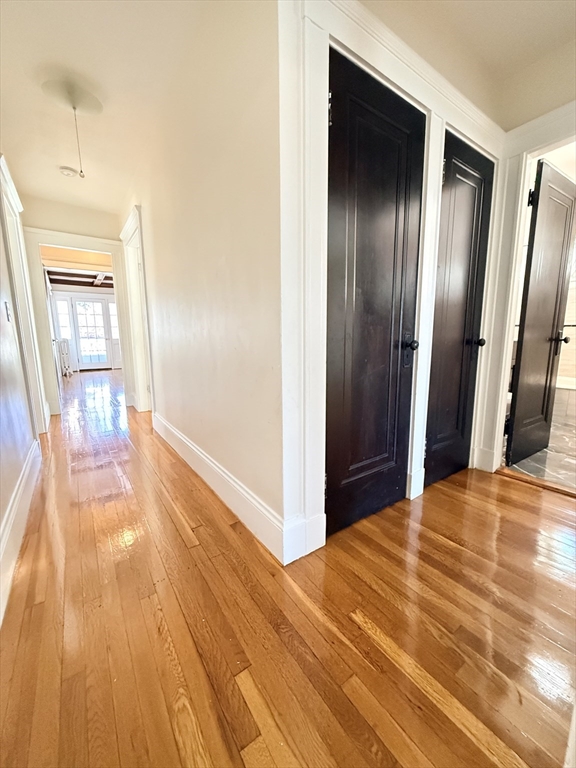 48 Rosewood Street, Unit 2 Boston, MA 02126 - Photo 17 of 26 a view of a livingroom with wooden floor