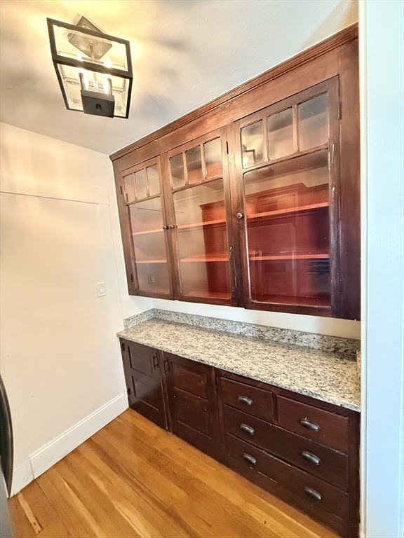 48 Rosewood Street, Unit 2 Boston, MA 02126 - Photo 22 of 26 a view of staircase with wooden floor
