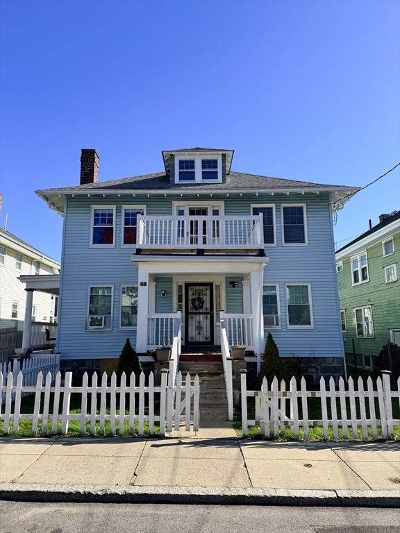 48 Rosewood Street, Unit 2 Boston, MA 02126 - Photo 26 of 26 a view of a brick house with many windows