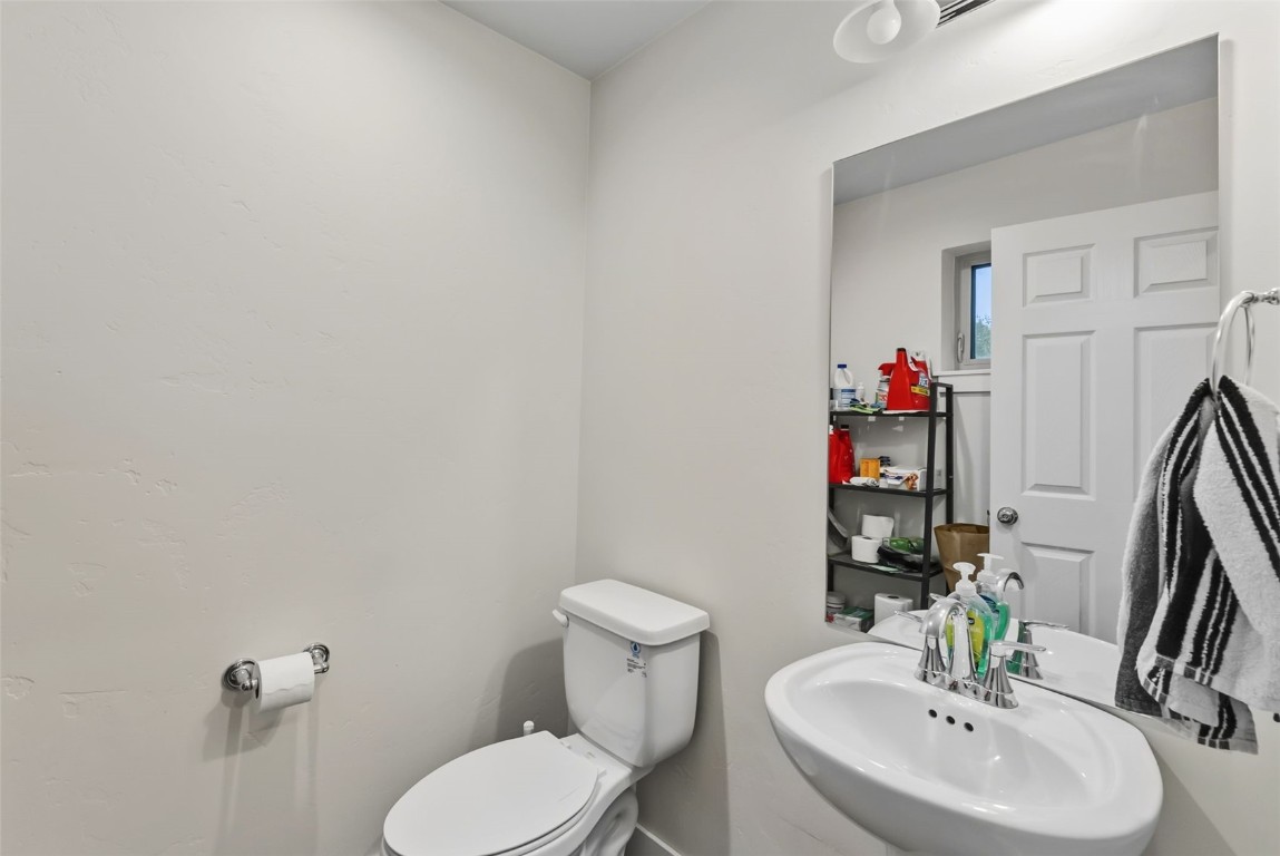 83 Ermine Road, Unit 3A Dillon, CO 80435 - Photo 14 of 33 a bathroom with a toilet sink and a mirror