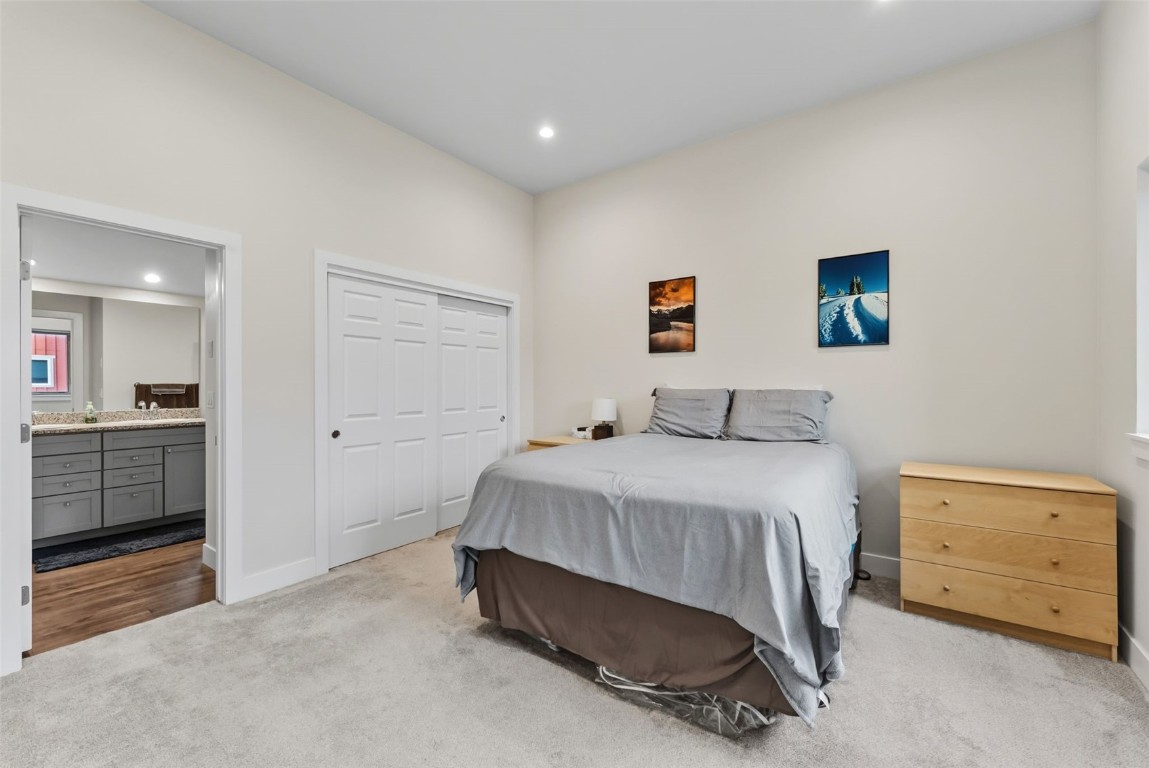 83 Ermine Road, Unit 3A Dillon, CO 80435 - Photo 20 of 33 a bedroom with a bed and a cabinets