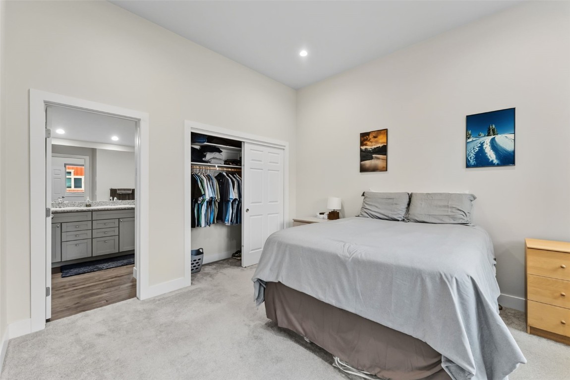 83 Ermine Road, Unit 3A Dillon, CO 80435 - Photo 24 of 33 a bedroom with a bed and a view living room