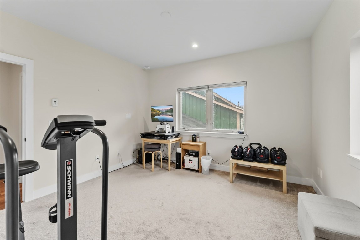 83 Ermine Road, Unit 3A Dillon, CO 80435 - Photo 25 of 33 a bedroom with furniture and a window