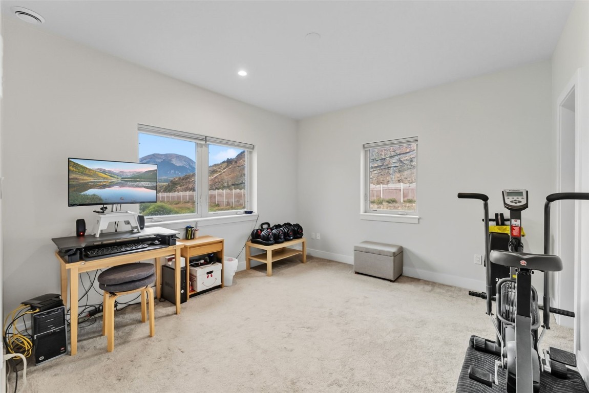 83 Ermine Road, Unit 3A Dillon, CO 80435 - Photo 26 of 33 a room with furniture a air conditioner vent and a window