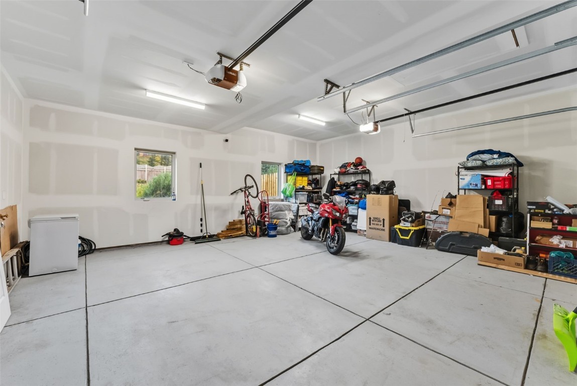 83 Ermine Road, Unit 3A Dillon, CO 80435 - Photo 27 of 33 a view of a garage with a bike and a car