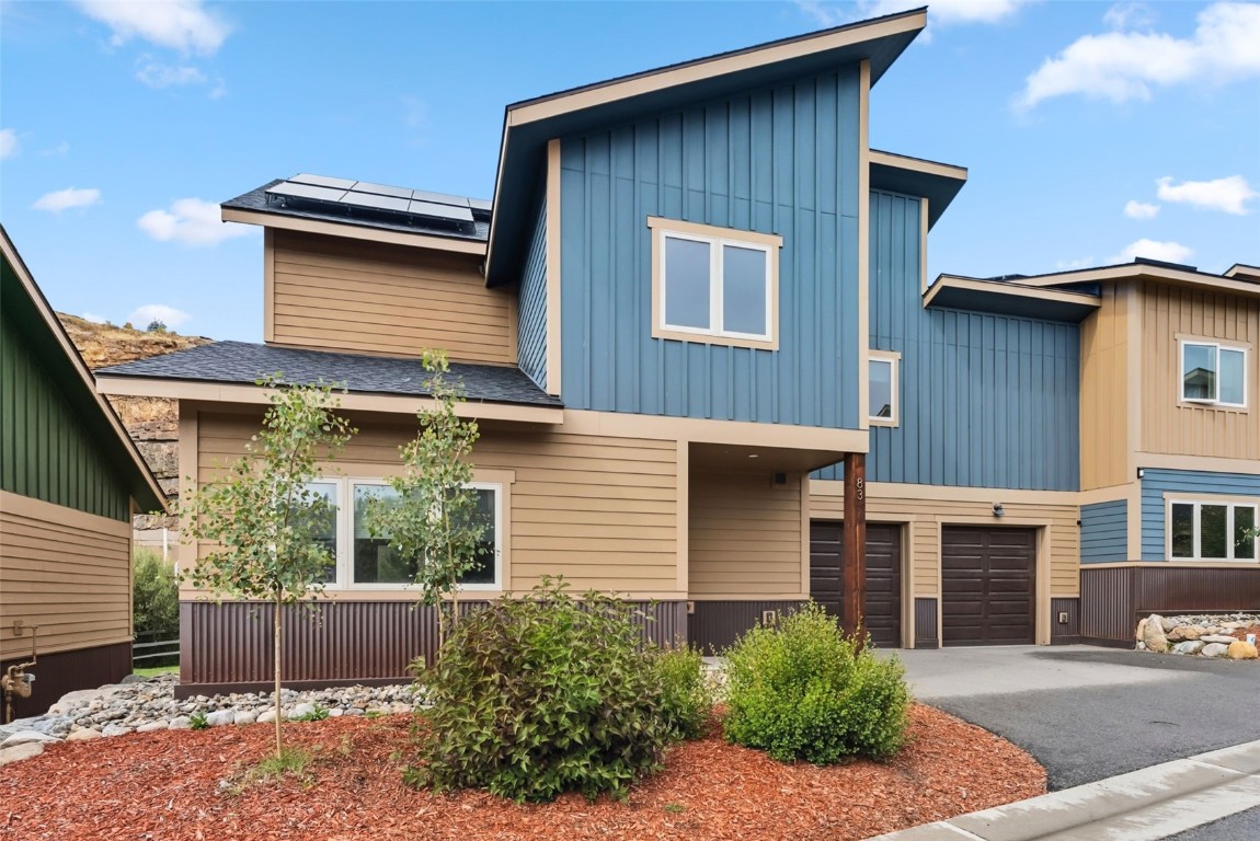 83 Ermine Road, Unit 3A Dillon, CO 80435 - Photo 30 of 33 a front view of a house with a garden