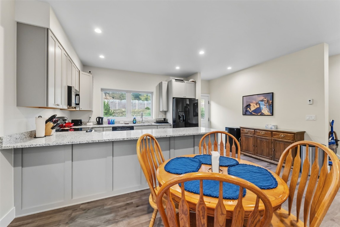 83 Ermine Road, Unit 3A Dillon, CO 80435 - Photo 6 of 33 a view of a dining room with furniture and a kitchen view