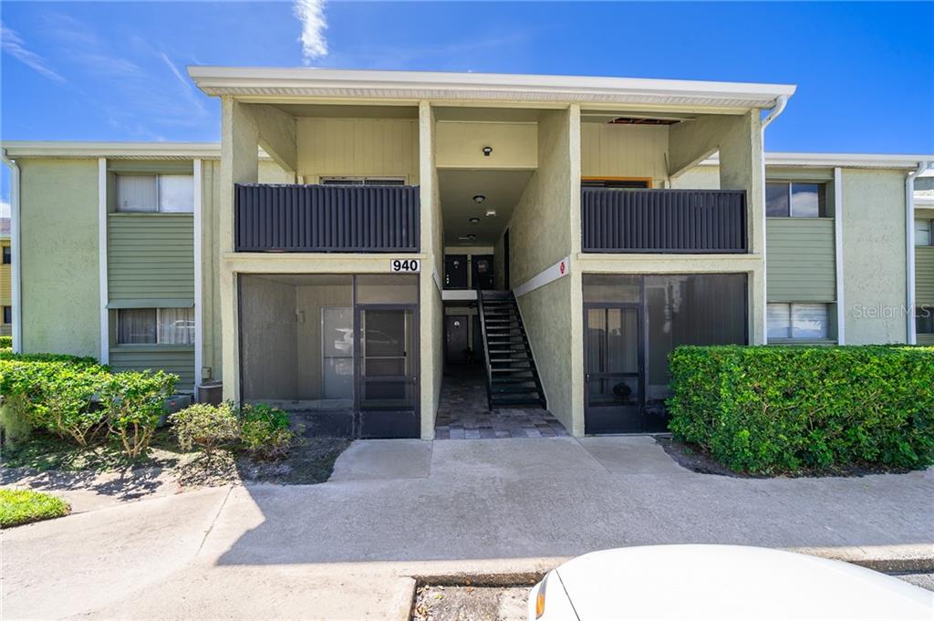 940 Lake Destiny Road, Unit G Altamonte Springs, FL 32714 - Photo 1 of 1 a front view of a house with a yard