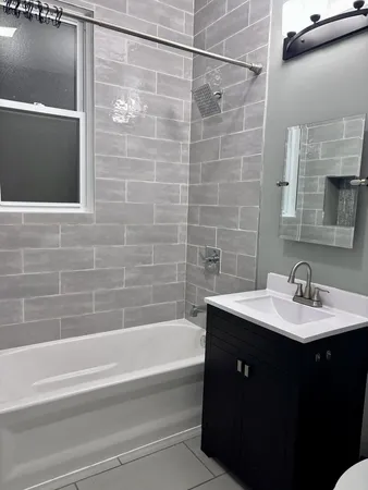 a bathroom with a sink and a bathtub