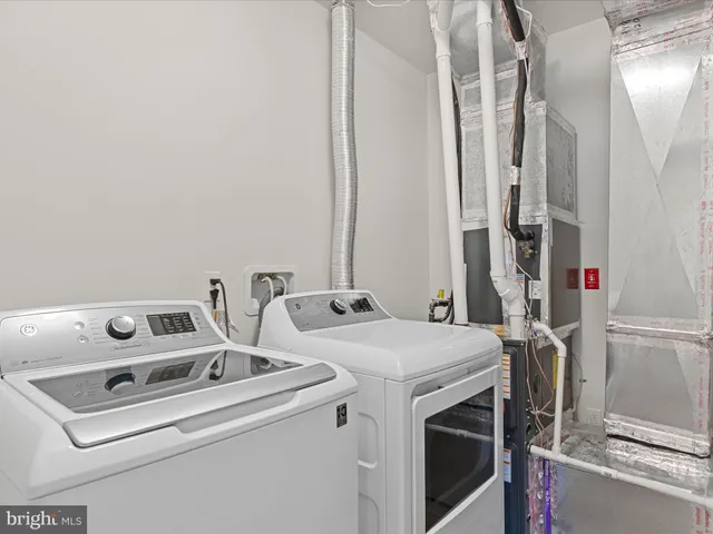 a city street lined with tall buildings