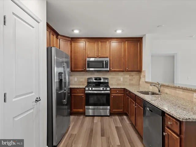 a room with gym equipment and a large mirror