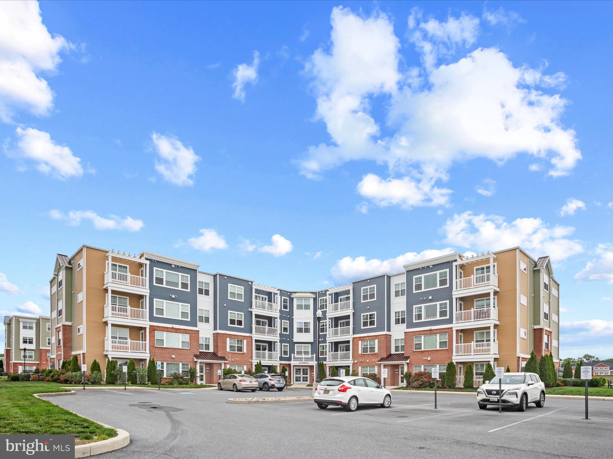 24258 Zinfandel Lane, Unit R303 Lewes, DE 19958 - Photo 44 of 82 a city street lined with tall buildings