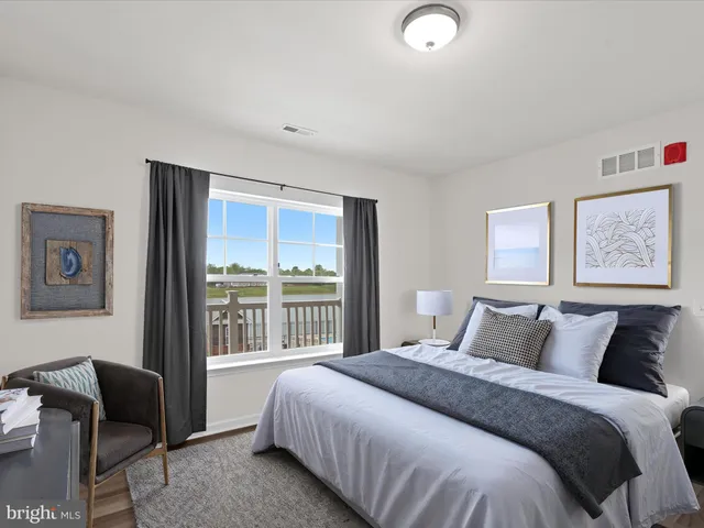 a view of lake and houses with outdoor space