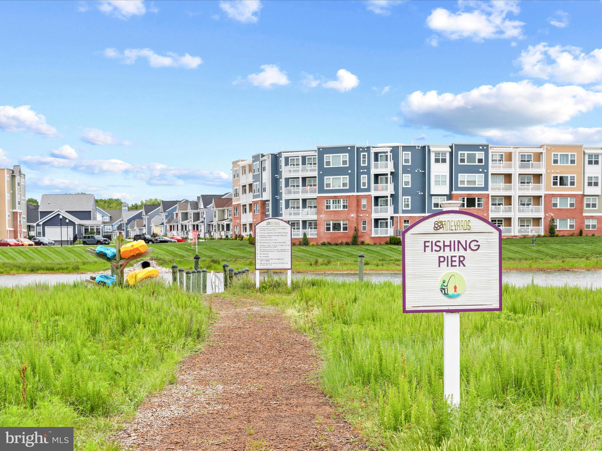 24258 Zinfandel Lane, Unit R303 Lewes, DE 19958 - Photo 73 of 82 a sign on the side of the building
