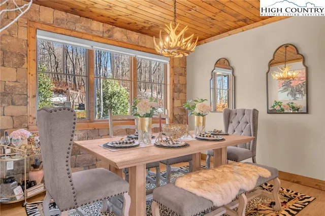 a view of a balcony with chairs