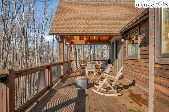 a view of balcony with furniture