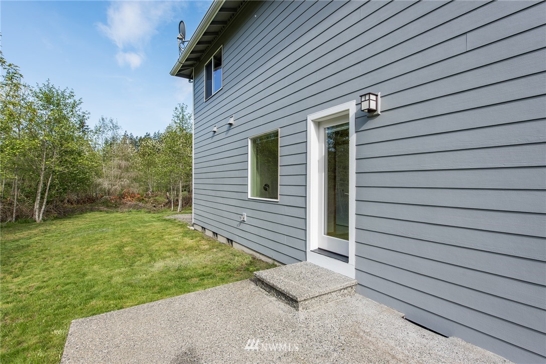 86 Hidden Valley Road Port Angeles, WA 98362 - Photo 11 of 23 a view of backyard of house