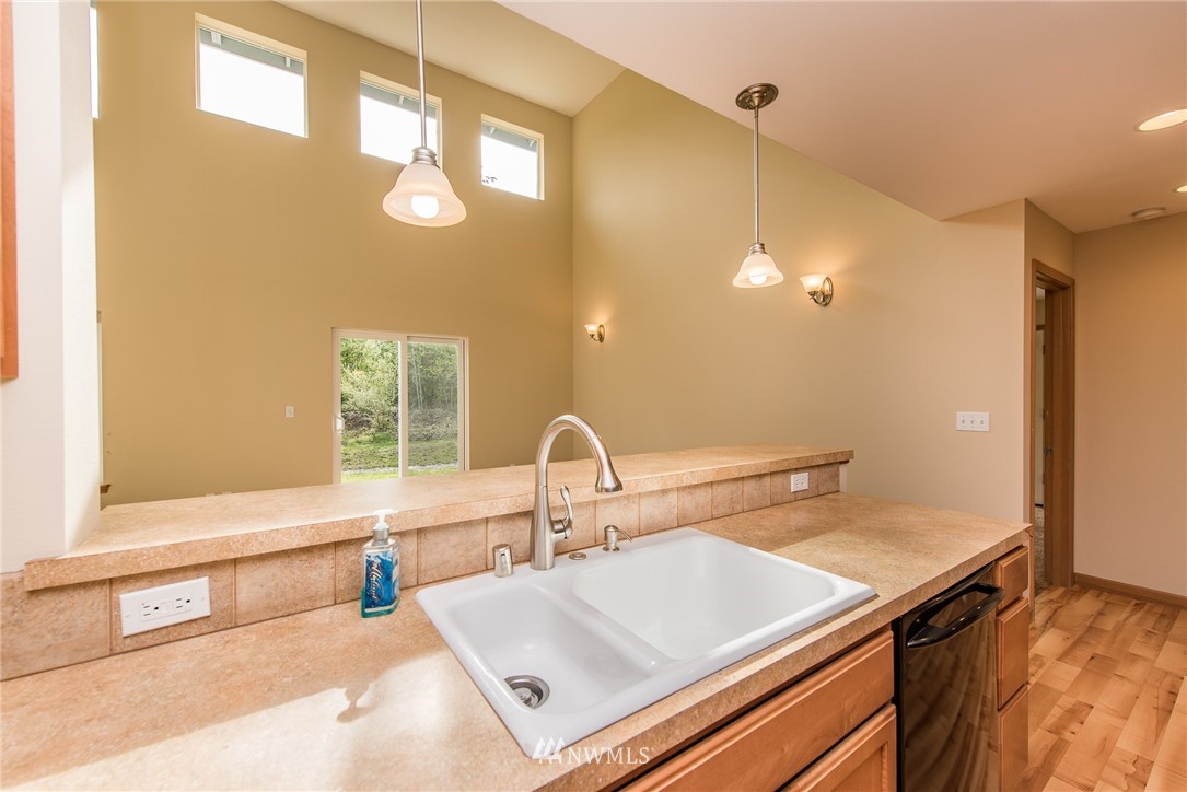 86 Hidden Valley Road Port Angeles, WA 98362 - Photo 16 of 23 a bathroom with a sink and a mirror