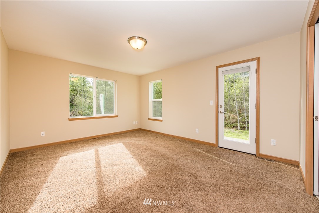 86 Hidden Valley Road Port Angeles, WA 98362 - Photo 18 of 23 an empty room with windows