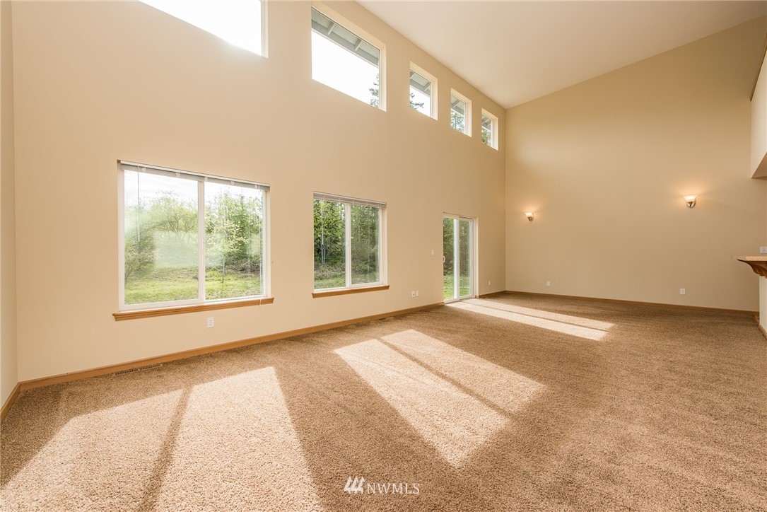 86 Hidden Valley Road Port Angeles, WA 98362 - Photo 7 of 23 a view of an empty room with a window