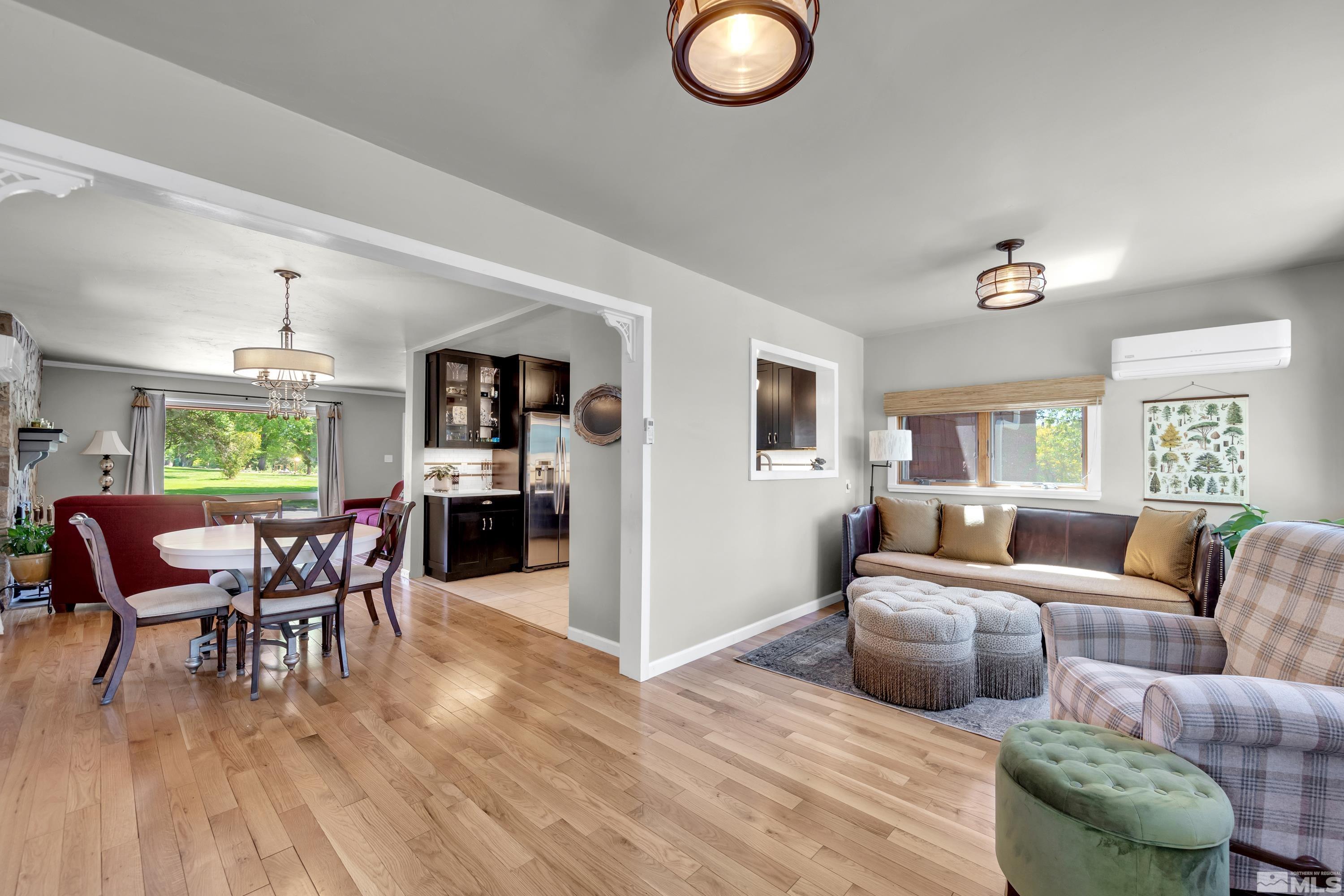 1575 Wesley Drive Reno, NV 89503 - Photo 13 of 40 a living room with furniture and wooden floor