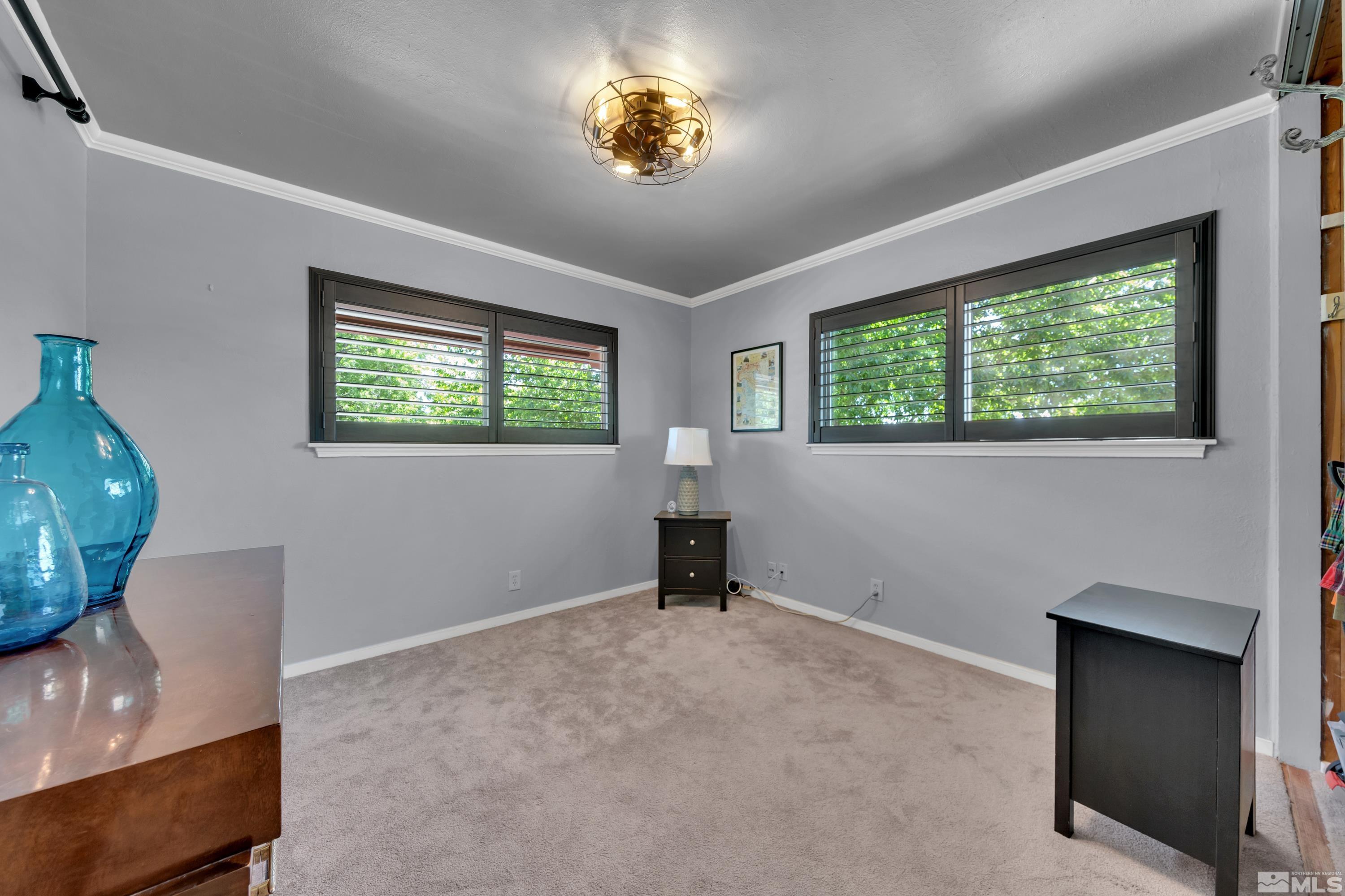1575 Wesley Drive Reno, NV 89503 - Photo 19 of 40 a living room with furniture and a window