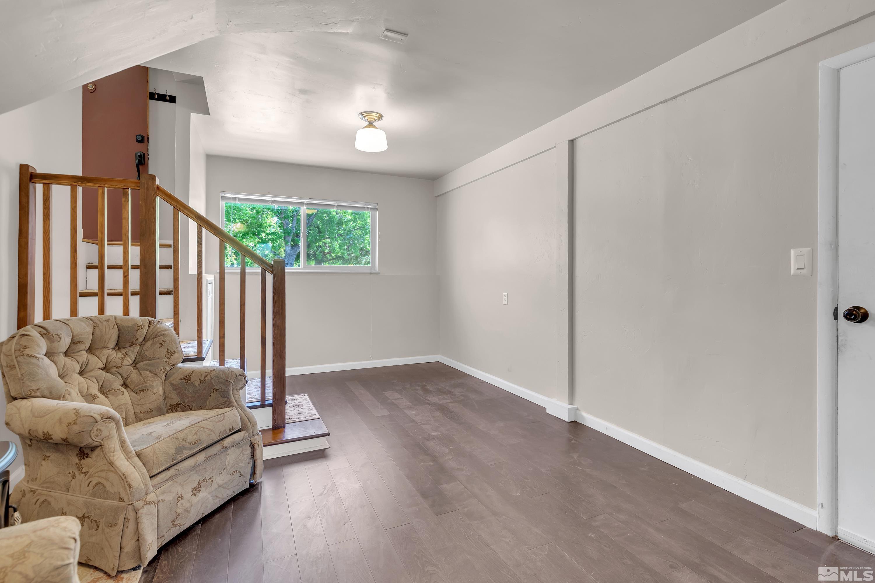 1575 Wesley Drive Reno, NV 89503 - Photo 25 of 40 a living room with furniture and a window