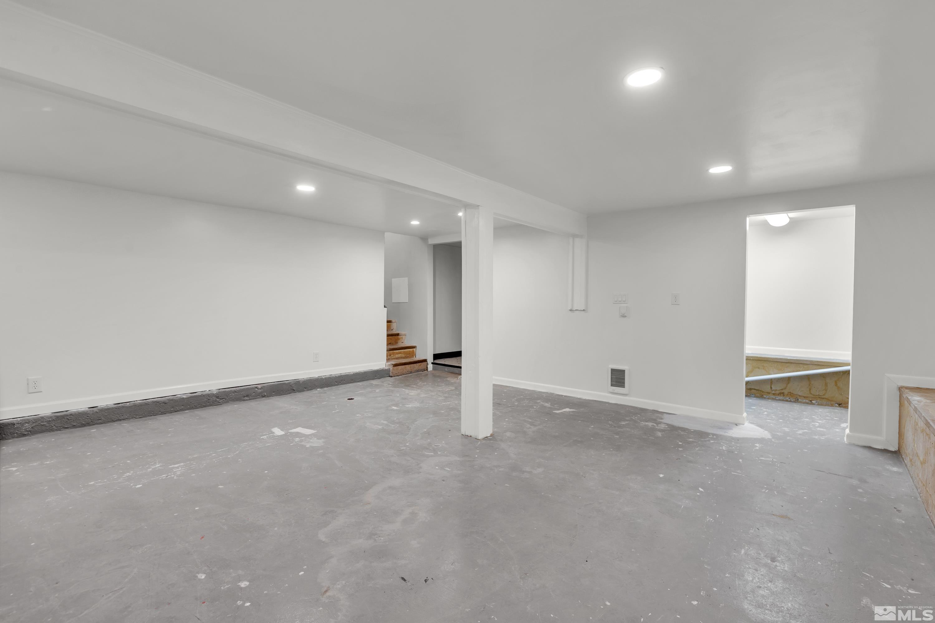 1575 Wesley Drive Reno, NV 89503 - Photo 28 of 40 an empty room with an entryway and an empty room