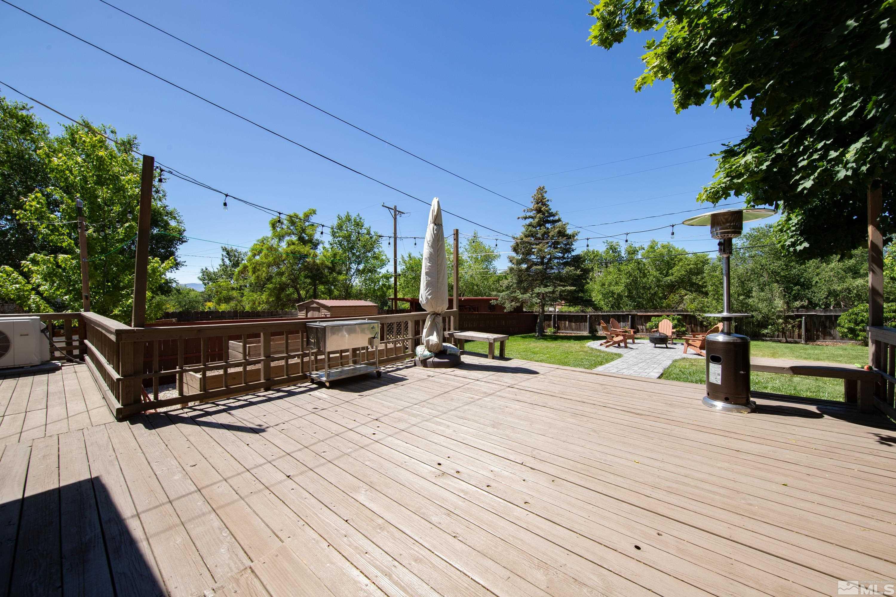 1575 Wesley Drive Reno, NV 89503 - Photo 33 of 40 a view of roof deck with wooden floor and seating space