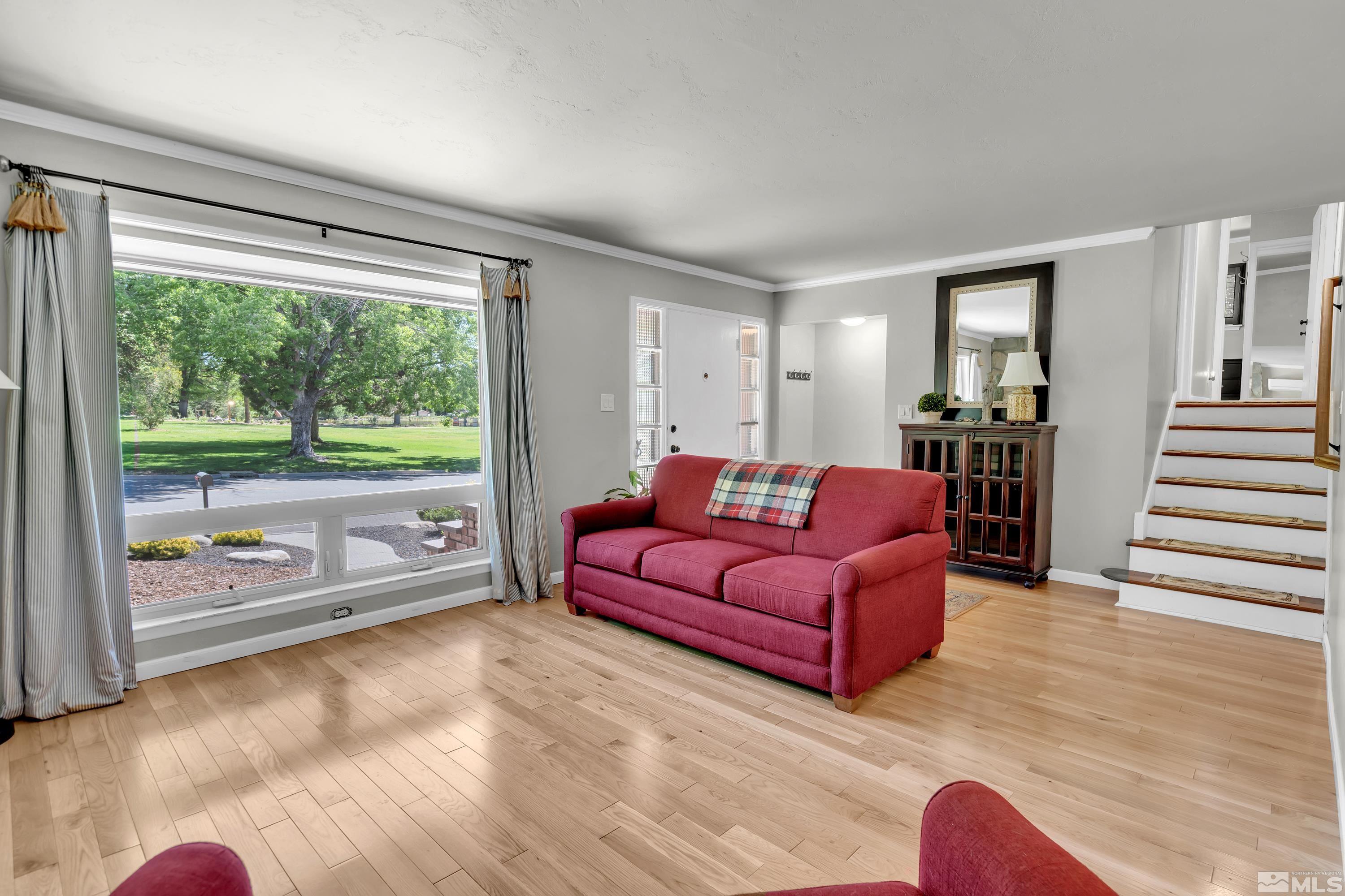1575 Wesley Drive Reno, NV 89503 - Photo 6 of 40 a living room with furniture and a large window