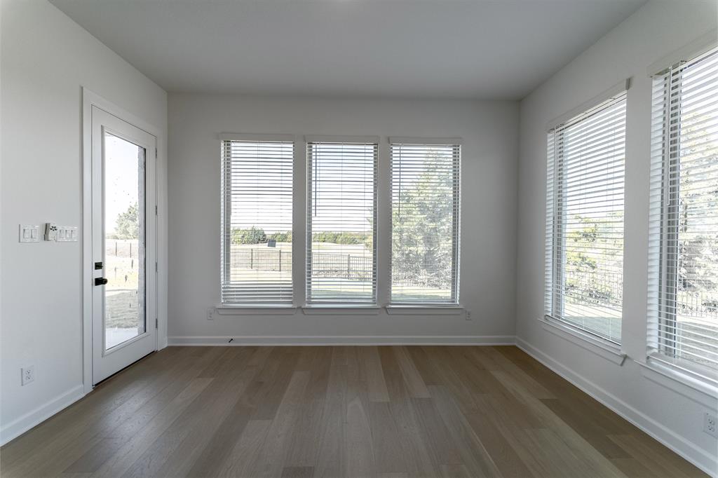 3912 Friendship Court Forney, TX 75126 - Photo 13 of 28 a view of an empty room with a window