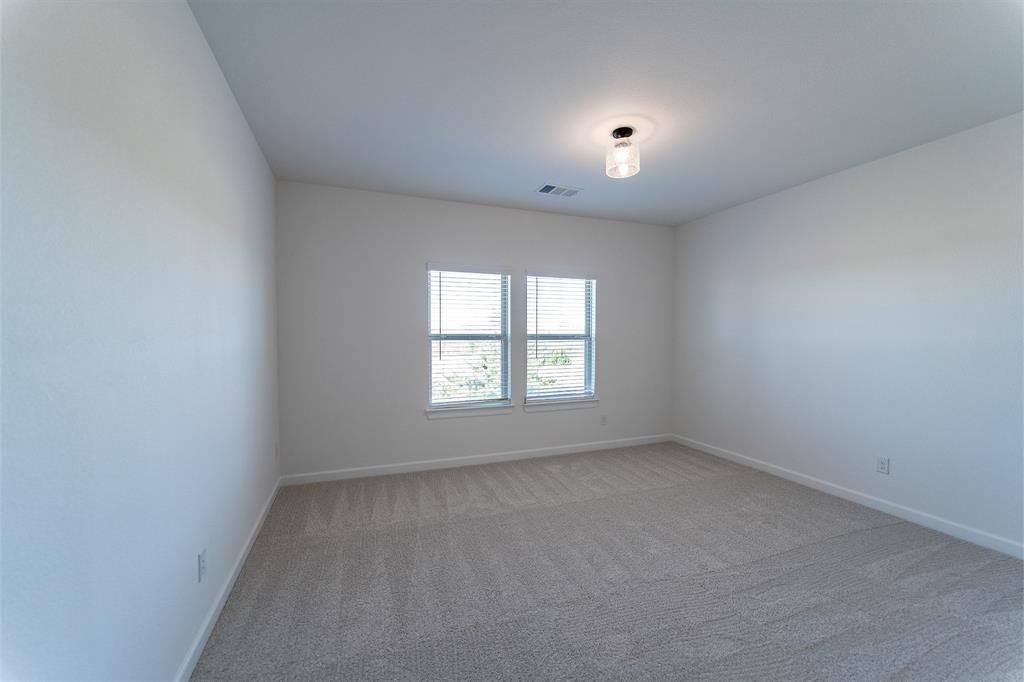 3912 Friendship Court Forney, TX 75126 - Photo 15 of 28 an empty room with a window