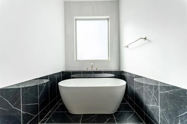 a view of a bathtub in a bathroom
