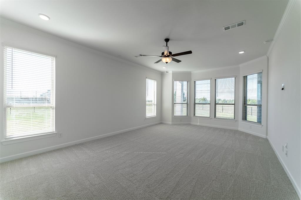 3912 Friendship Court Forney, TX 75126 - Photo 22 of 28 a view of an empty room with a window