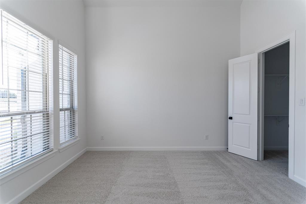 3912 Friendship Court Forney, TX 75126 - Photo 24 of 28 a view of an empty room with a window