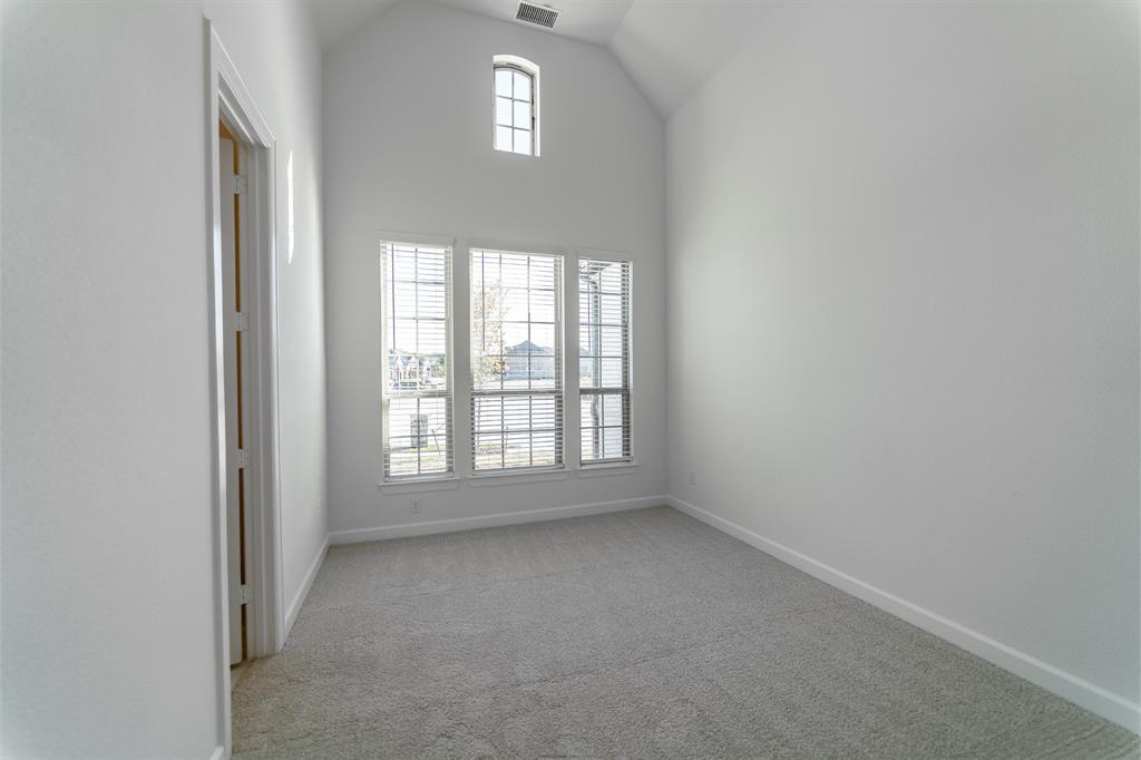 3912 Friendship Court Forney, TX 75126 - Photo 26 of 28 an empty room with a window