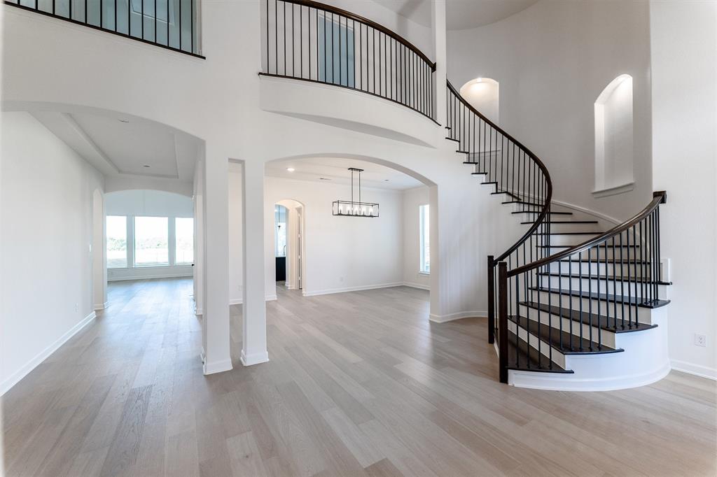 3912 Friendship Court Forney, TX 75126 - Photo 4 of 28 a view of entryway with wooden floor