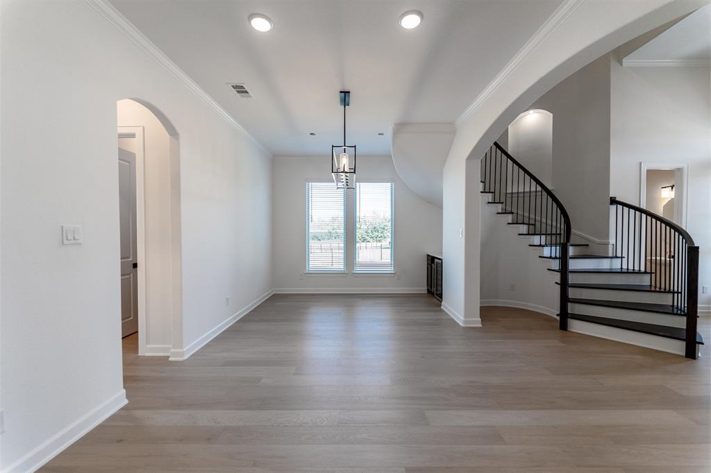 3912 Friendship Court Forney, TX 75126 - Photo 5 of 28 a view of entryway and hall with wooden floor
